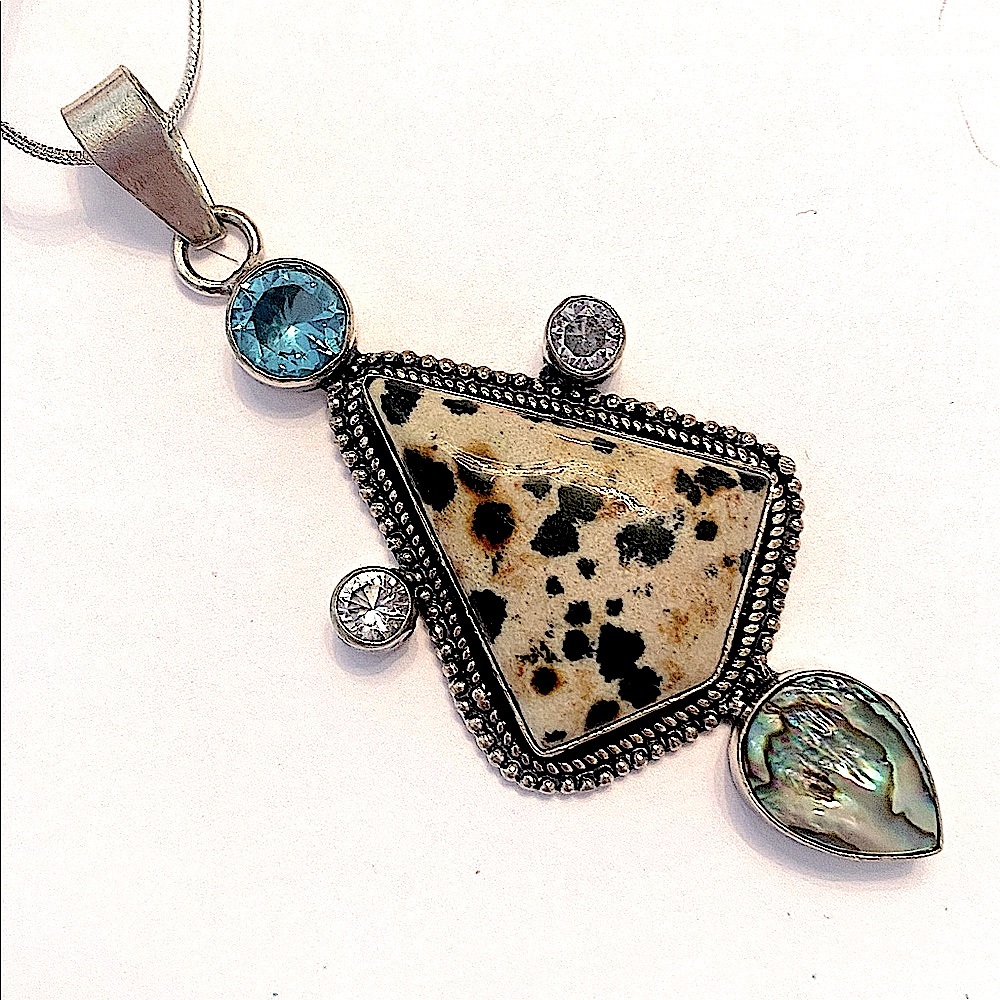 2 1/2 inch, Dalmation Jasper and Abalone Shell  pendant on a silver chain.